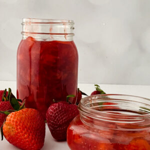Easy Homemade Strawberry Preserves Recipe 8 strawberries in airtight jar strawberry preserves