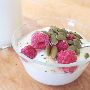yogurt with strawberry nuts in a bowl 1