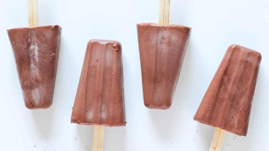 21 Delightful Homemade Popsicle Recipes 11 chocolate fudge popsicles lined up
