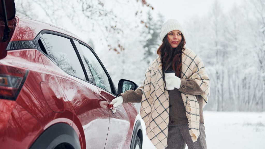 15 Bills You Should Always Pay Early to Avoid Stress and Fees 3 woman with blanket entering car in snow cold