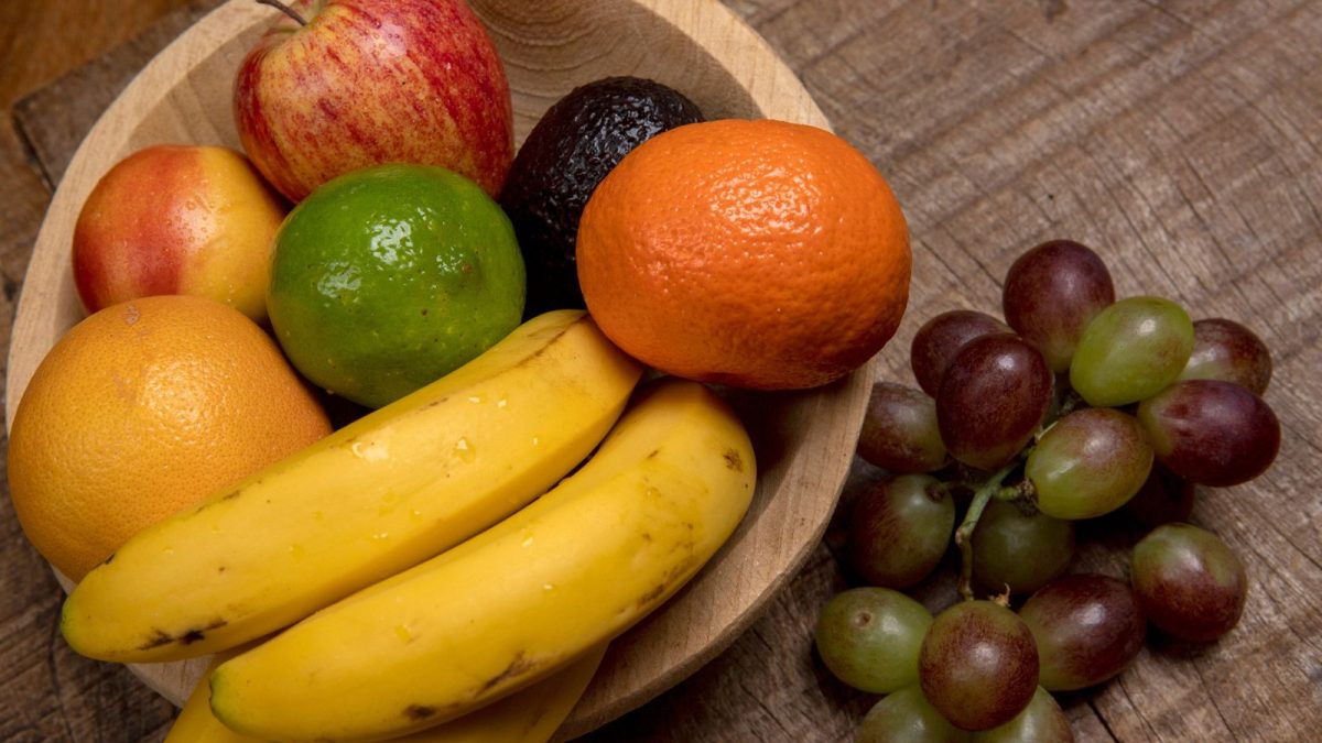 16 Hacks to Help You Use Every Bit of Fresh Produce Before It Goes Bad 16 fruit basket with banana apple oranges avocado