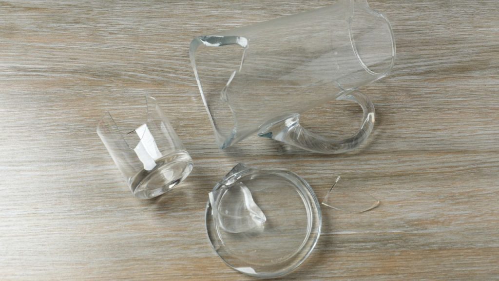 19 Survival Uses for Rubber Bands Everyone Should Know 11 Broken glass with jug on a wooden background