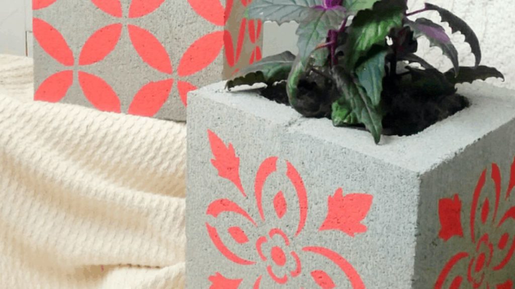 25 Creative Ways to Turn Old Junk into Beautiful Planters for Your Garden 8 DIY Stenciled Concrete Block Planters