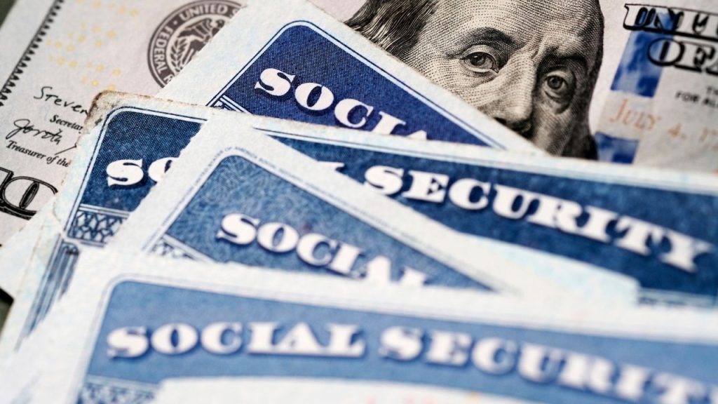 19 Important Documents You Should Never Throw Out 9 Several Social Security Cards on a US United States one hundred dollar bill $100 system of benefits for retired elderly people