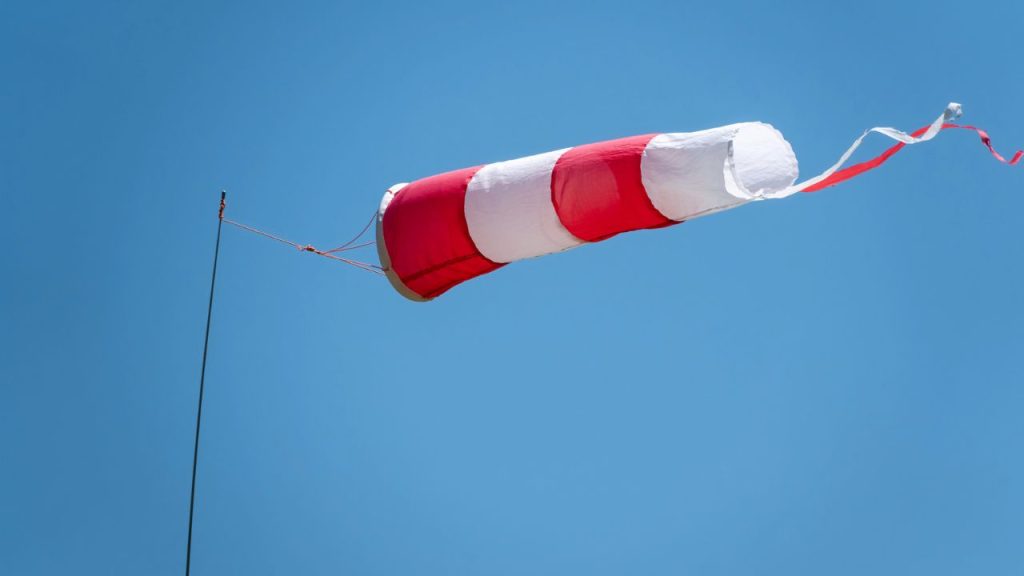 15 Ways to DIY Forecast the Weather 2 Windsock on a background of blue sky on a sunny day.