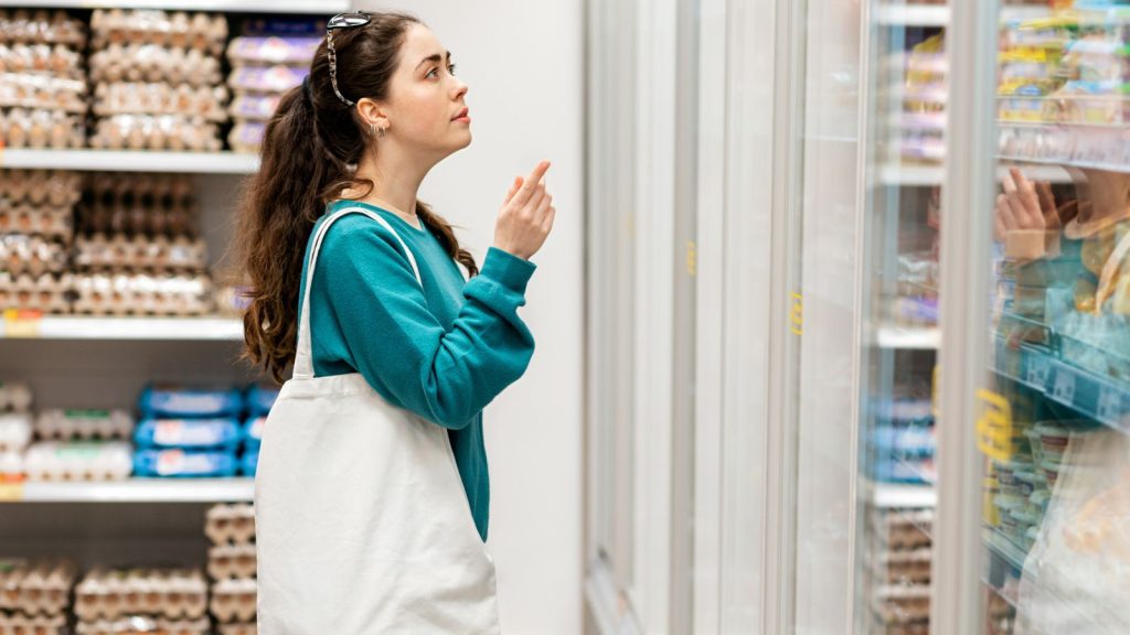 woman with bag in a grocery store