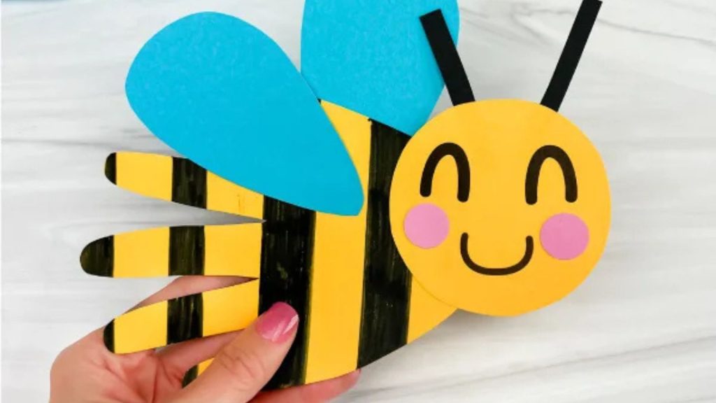 23 Super Cute Bumble Bee Crafts to Share Your Love for These Pollinators 1 Handprint Bee Craft For Kids