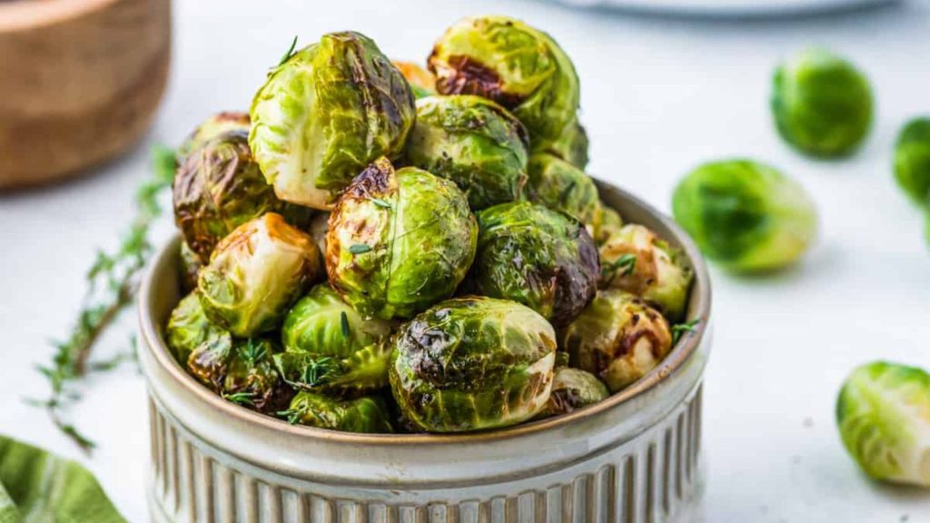 23 Easy, Tasty, and Totally Addictive Air Fryer Vegetables 14 A bowl of brussels sprouts that were made in an air fryer.