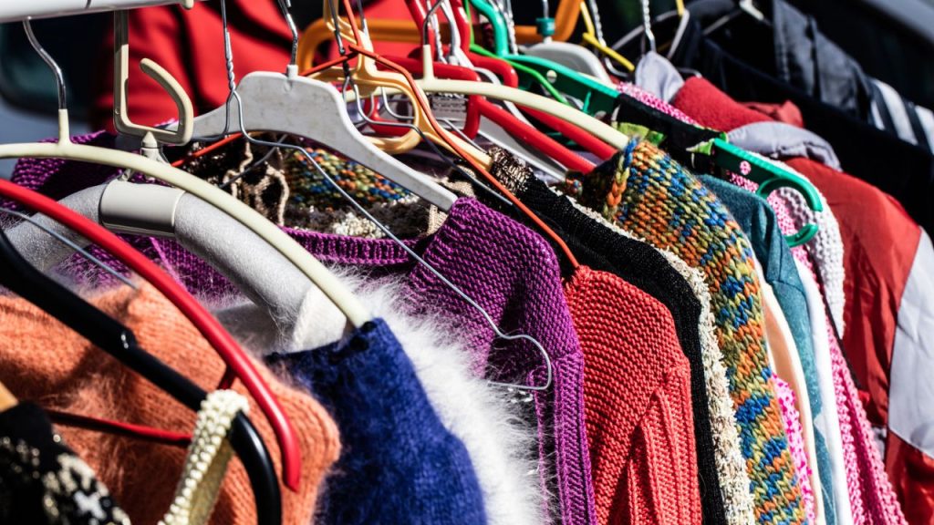 clothes on a thrift store rack