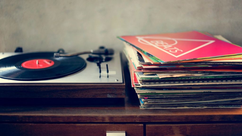 18 Creative Grandma-Era Hobbies That Relieve Stress and Boost Happiness 7 vinyl player and records
