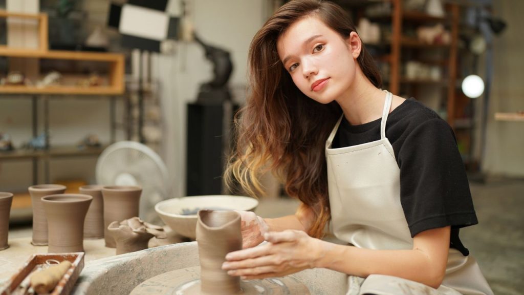 14 Things You Should Never Store in the Basement 15 woman doing ceramics