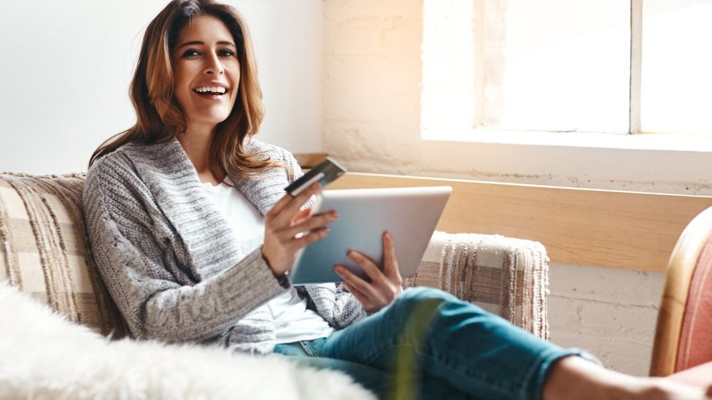 woman with credit card in hand