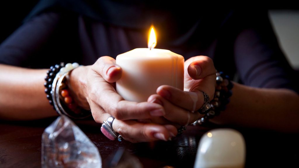 14 Critical Items That Separate the Prepared From the Unprepared 3 lady holding candle