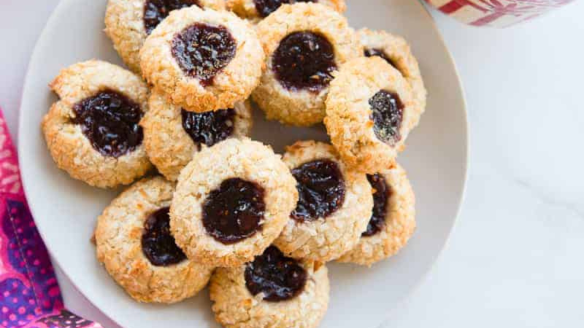 22 Raspberry Desserts That Are Bursting with Flavor 9 Coconut Raspberry Thumbprint Cookies