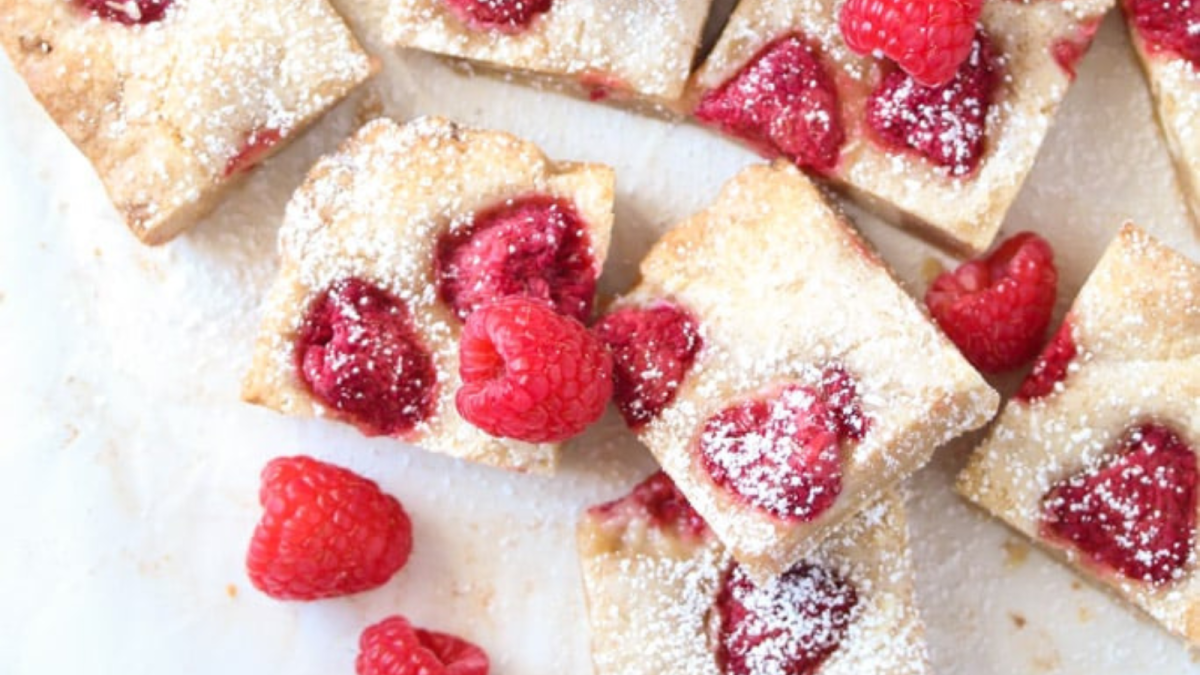 22 Raspberry Desserts That Are Bursting with Flavor 15 White Chocolate and Raspberry Blondies