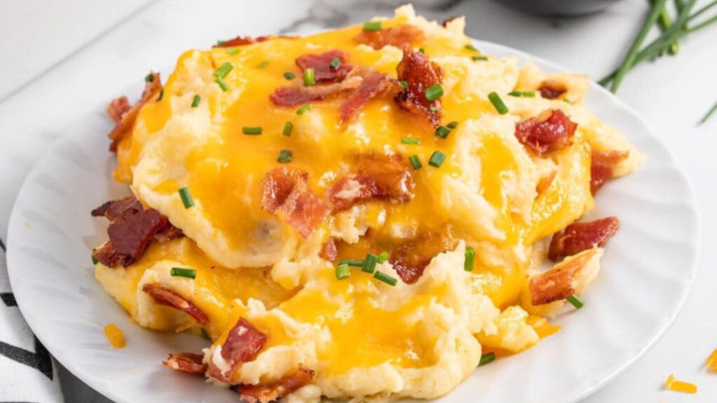24 Potato Recipes You’ll Never Get Tired Of 13 Mashed potato casserole on a plate.